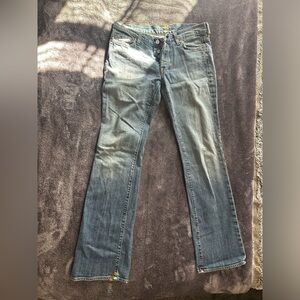 light wash flared mid rise jeans